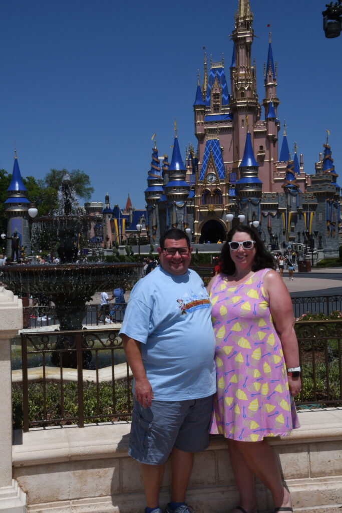 Dave and Toni in front of the castle at Walt Disney World